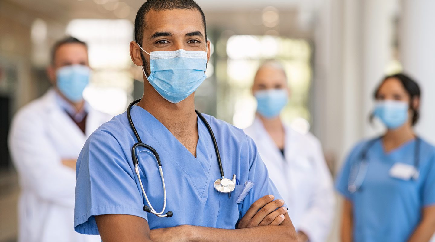 Hospital workers with face masks on